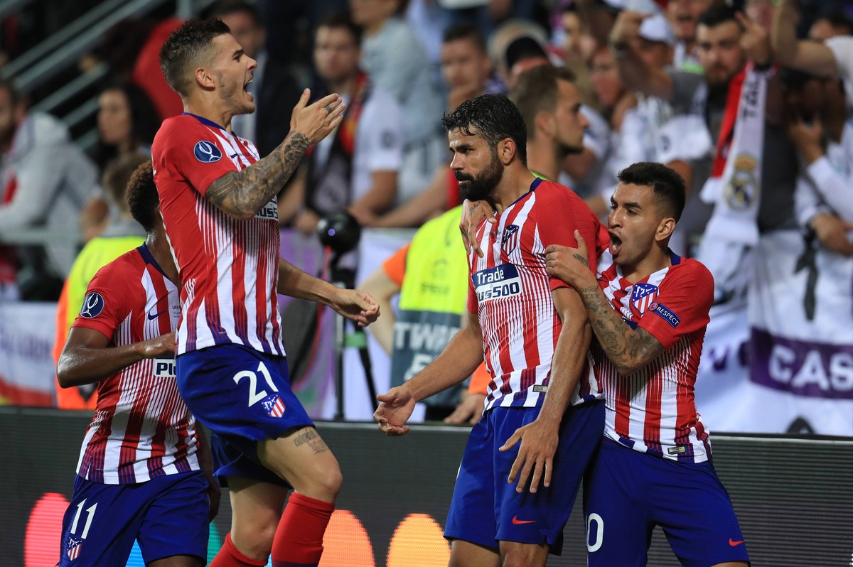 Real Madrid v Atletico Madrid - UEFA European Super Cup - Lillekula Stadium Atletico Madrid s Diego Costa (centre) celebrates scoring his side s second goal of the game with team mates Atletico Madrid ...