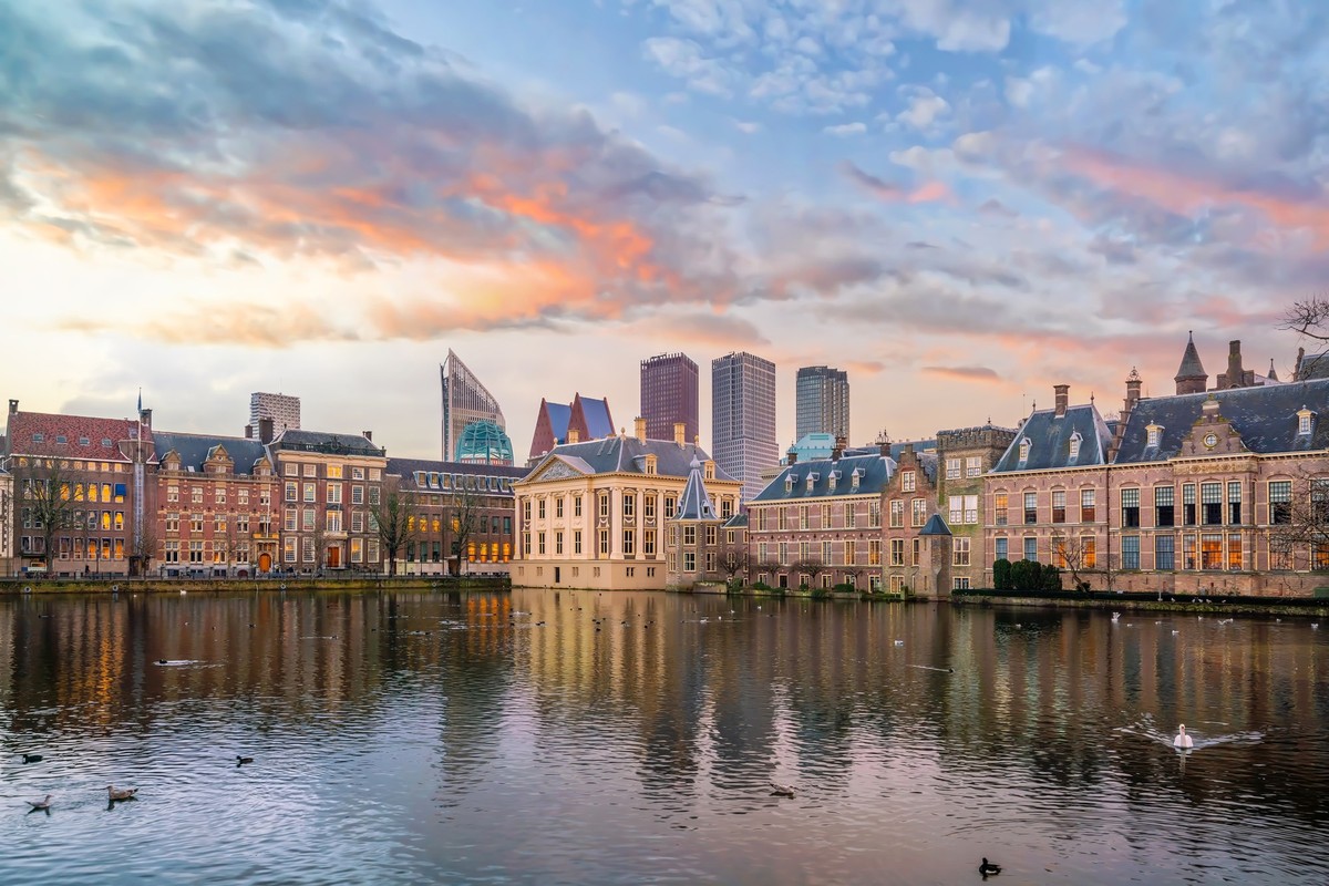 Binnenhof castle (Dutch Parliament) cityscape downtown skyline of Hague in Netherlands at sunset