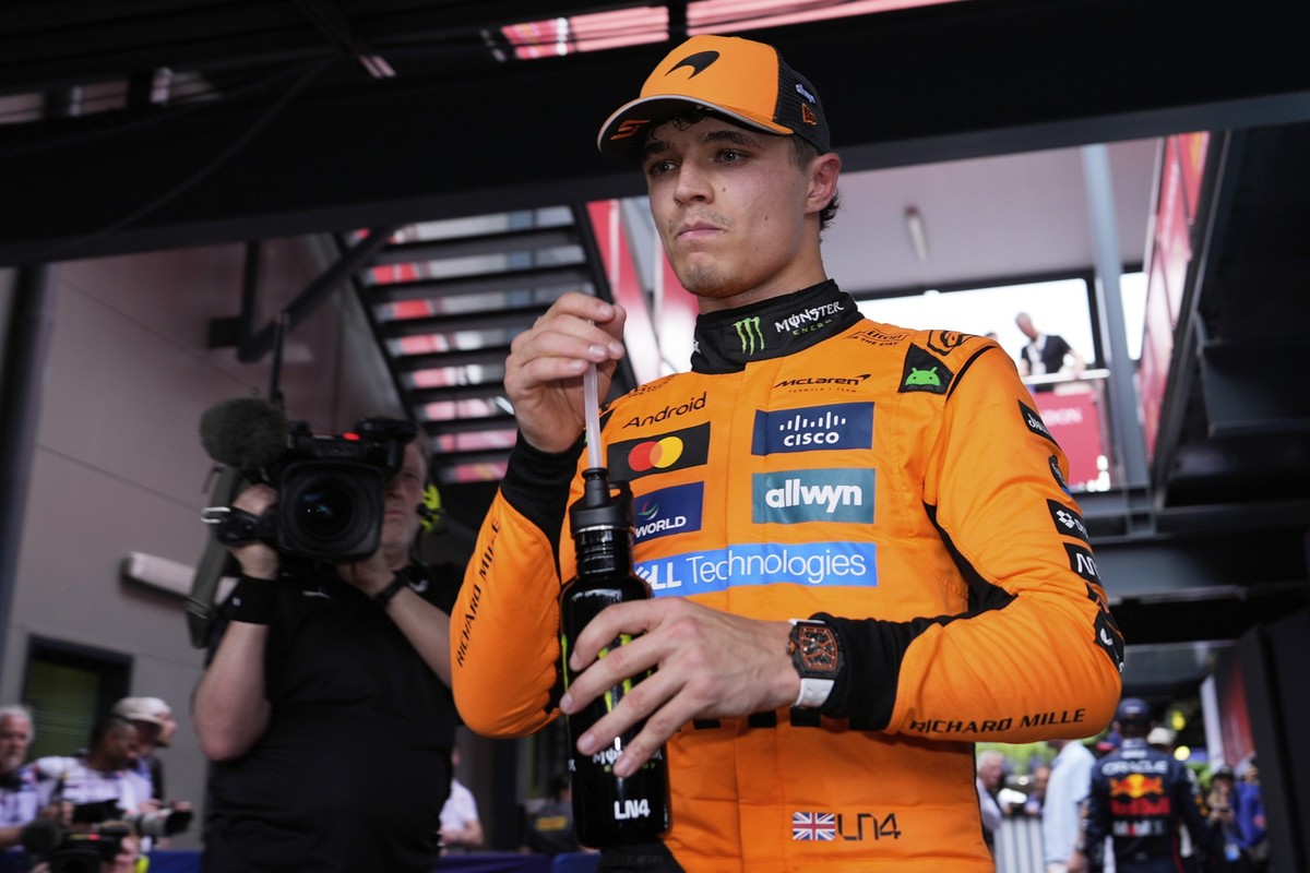 McLaren driver Lando Norris of Britain reacts after taking pole during qualifying at the Australian Formula One Grand Prix at Albert Park, in Melbourne, Australia, Saturday, March 15, 2025. (AP Photo/ ...