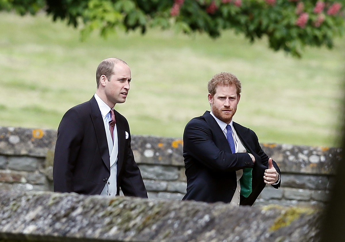 ENGLEFIELD, ENGLAND - MAY 20: Britain's Prince William, left, and his brother Prince Harry arrive for the wedding of Pippa Middleton and James Matthews at St Mark's Church on May 20, 2017 in ...