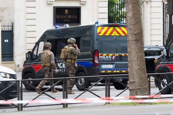 Man With Explosives Breaks Into Iranian Consulate - Paris A security perimeter was set up in front of the Iranian consulate, in Paris s 16th arrondissement, after a witness saw a man enter with a gren ...