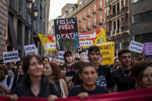 People take part in a Global Climate Strike &#039;Fridays For Future&#039; protest in Madrid, Spain, Friday, Sept. 15, 2023. Tens of thousands of climate activists around the world are set to march, c ...