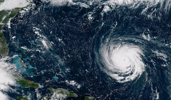 News Bilder des Tages September 10, 2018 - U.S. - This photo provided by shows Hurricane Florence from the International Space Station on Monday, as it threatens the U.S. East Coast. Florence has expl ...