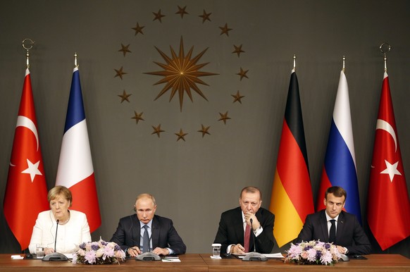 From left, German Chancellor Angela Merkel, Russian President Vladimir Putin,Turkey&#039;s President Recep Tayyip Erdogan and French President Emmanuel Macron attend a news conference following their  ...