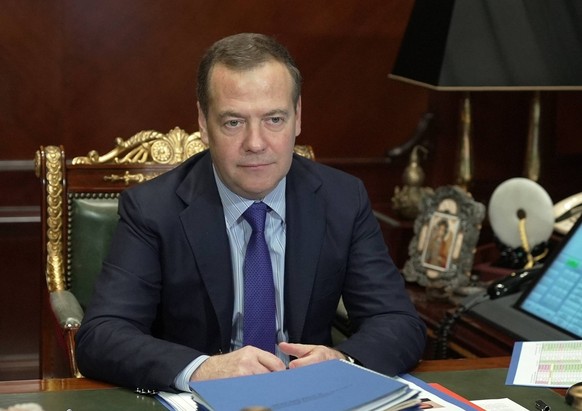 Russia Medvedev 8273371 13.09.2022 Deputy chairman of the Russian Security Council Dmitry Medvedev meets with Volgograd Region Governor Andrei Bocharov via a video conference at the Gorky state reside ...