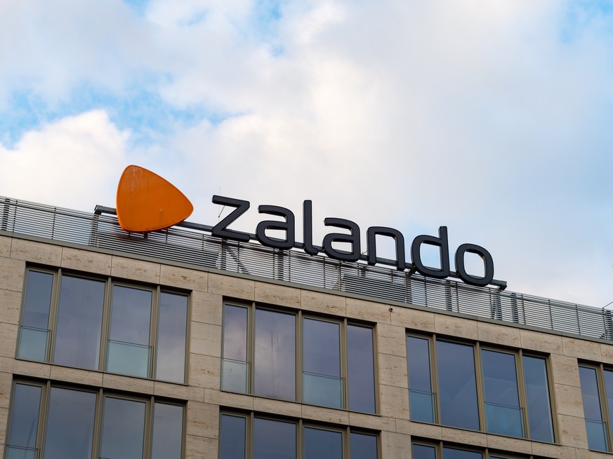 Zalando logo sign on the headquarters building exterior. Big icon of the e-commerce business. The company sells fashion goods and accessories via the internet. Model Released Property Released xkwx be ...