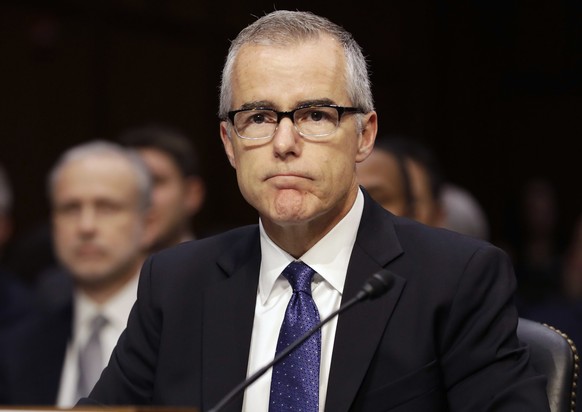FILE - In this May 11, 2017, file photo then-acting FBI Director Andrew McCabe listens on Capitol Hill in Washington. The Justice Department has repeatedly refused to provide McCabe with documents rel ...