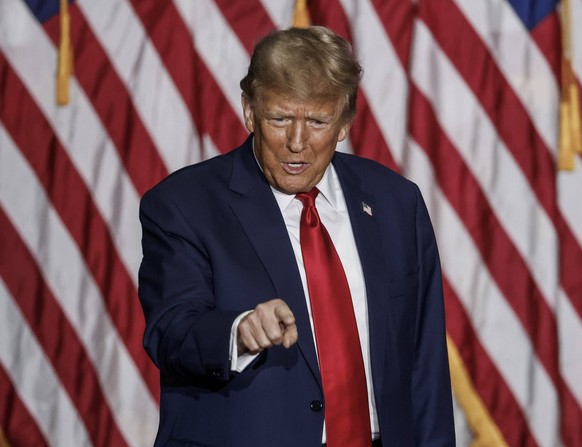 Former US President Donald J. Trump celebrates his win in the 2024 Iowa Caucus at the Iowa Events Center in Des Moines, Iowa on Monday, January 15, 2024. Next up in the race for the White House will b ...
