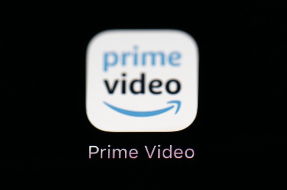 FILE - The Amazon Prime Video streaming app is seen on an iPad screen, March 19, 2018, in Baltimore. Prime will include ads beginning Monday, Jan. 29, 2024, the company said in an email to U.S. member ...