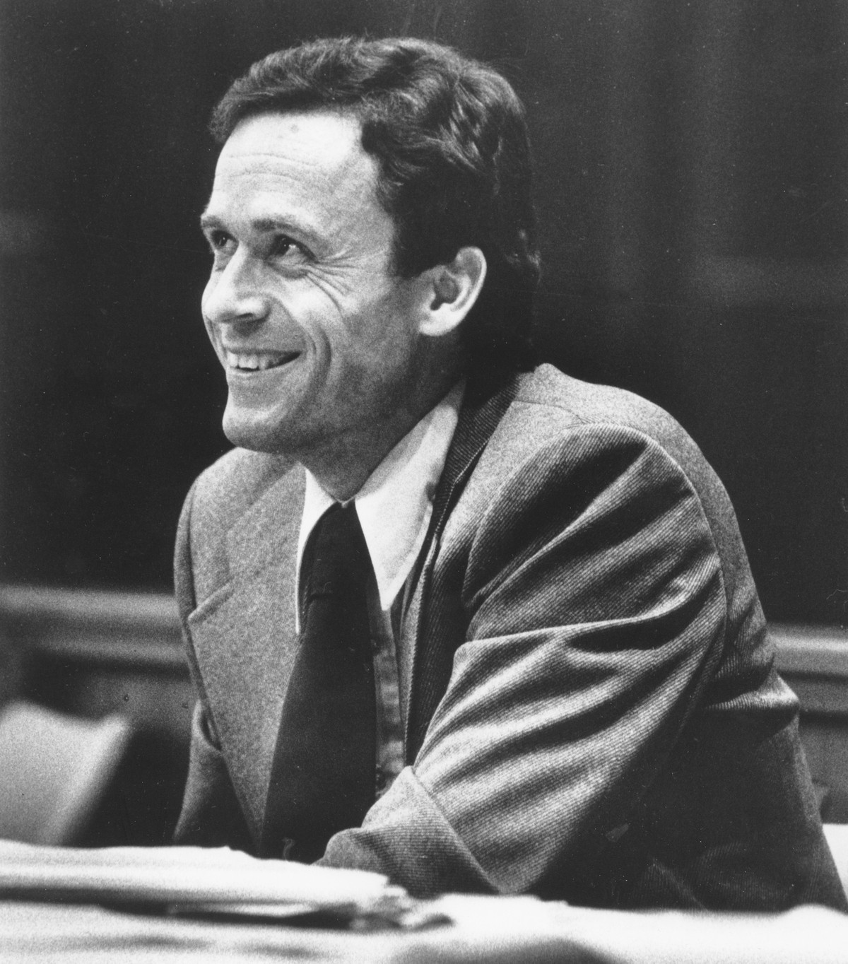 Accused murderer Theodore Bundy smiles during the second day of jury selection in his murder trial in a Dade County courtroom in Miami, Fla., on June 27, 1979. Bundy is being tried for the murders of ...