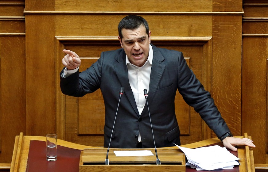 Greek Prime Minister Alexis Tsipras addresses lawmakers during a parliamentary session on confidence vote in Athens, Greece, January 15, 2019. REUTERS/Costas Baltas