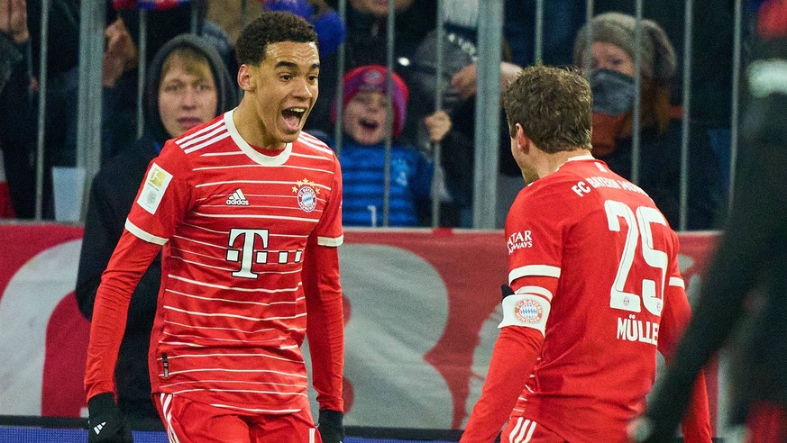 Jamal MUSIALA, FCB 42 celebrates his goal, happy, laugh, celebration, 3-0 with Thomas MUELLER, MÜLLER, FCB 25 in the match FC BAYERN MUENCHEN - 1. FC UNION BERLIN 1.German Football League on Feb 26, 2 ...