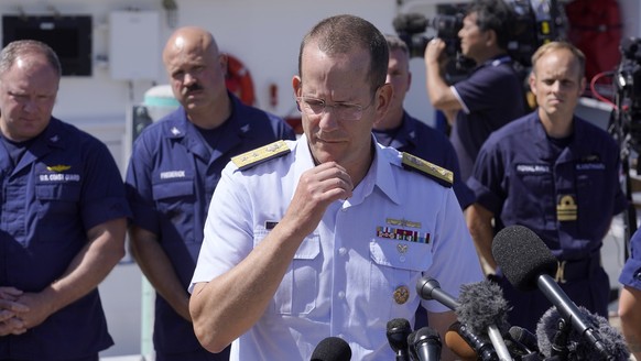 U.S. Coast Guard Rear Adm. John Mauger, commander of the First Coast Guard District, talks to the media, Thursday, June 22, 2023, at Coast Guard Base Boston, in Boston. The missing submersible Titan i ...