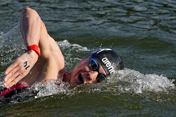 09.08.2024, Olympia, Paris 2024, Schwimmen, Freiwasser, M�nner 10km, Oliver Klemet aus Deutschland schwimmt in der Seine. Foto: Michael Kappeler/dpa +++ dpa-Bildfunk +++