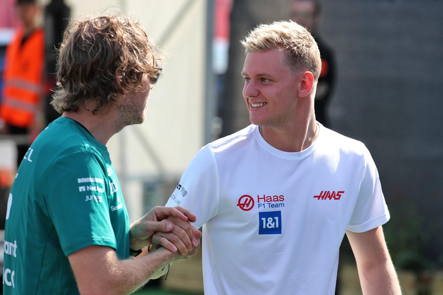 Spanish Grand Prix - Practice Session - Circuit de Catalunya. (L to R): Sebastian Vettel (GER) Aston Martin F1 Team with Mick Schumacher (GER) Haas F1 Team. Spanish Grand Prix, Friday 20th May 2022. B ...