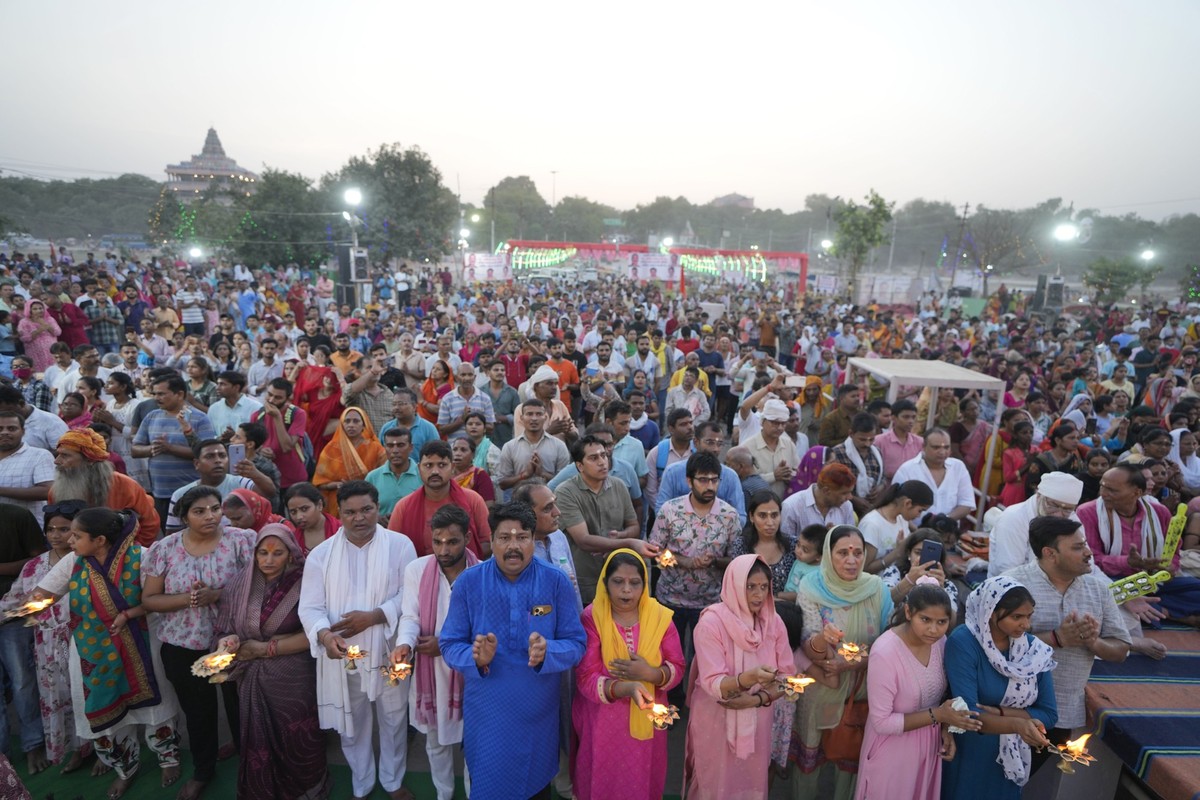Hindu devotees offer evening prayers at Sangam, the confluence of the Rivers Ganges, Yamuna and the mythical Saraswati, on the occasion of Ganga Dussehra festival in Prayagraj, Uttar Pradesh state, In ...