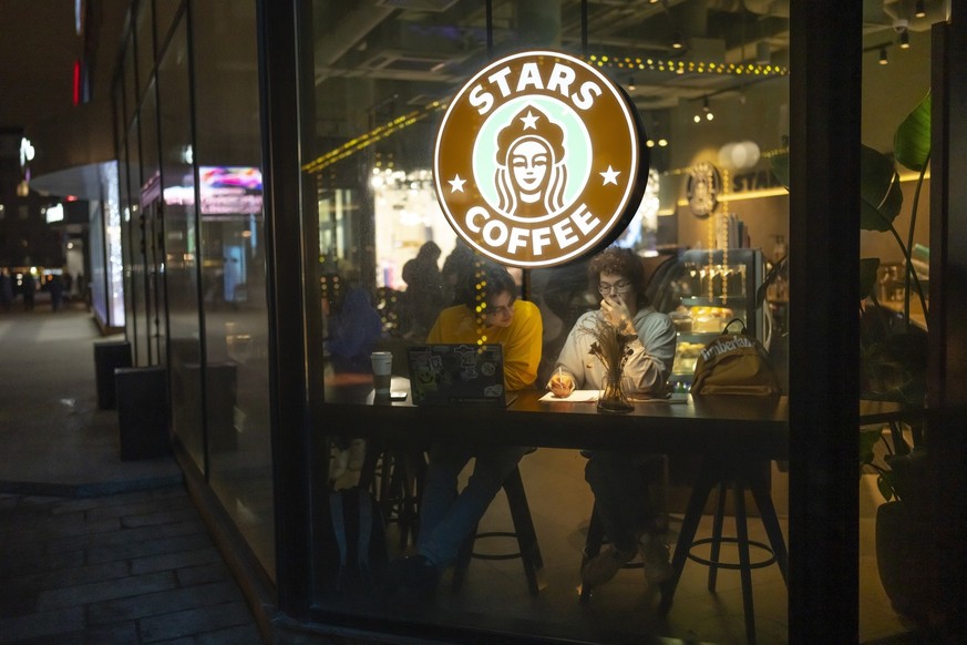 FILE - A logo of a newly opened Stars Coffee in the former location of a Starbucks in Moscow, Russia, on Jan. 24, 2023. When Russia invaded Ukraine, companies were quick to respond, some announcing th ...