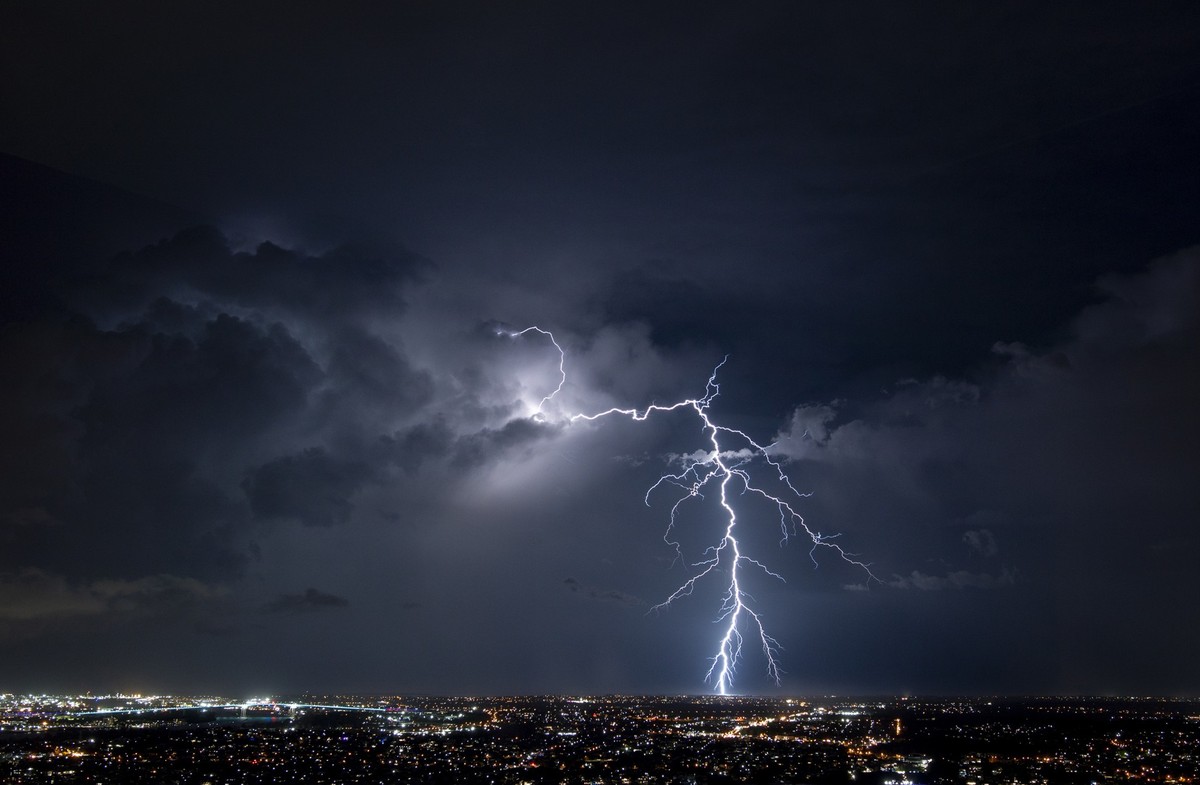What is lightning? Is it electricity being discharged from a build up of static in the clouds, or is it a sign from above of someone trying to plug in their hair straightener, and they can only find p ...