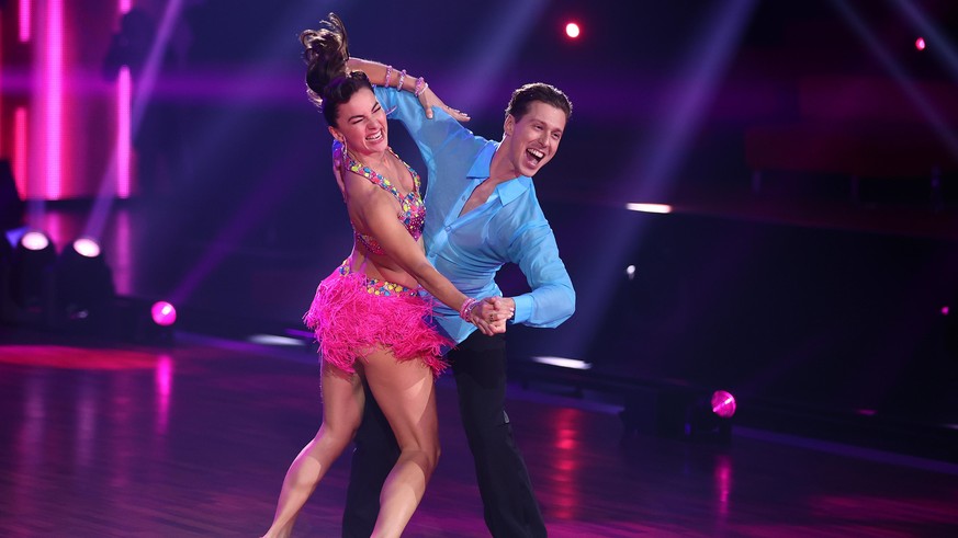 COLOGNE, GERMANY - MARCH 19: Renata Lusin and Valentin Lusin perform on stage during the 3rd show of the 14th season of the television competition &quot;Let&#039;s Dance&quot; on March 19, 2021 in Col ...