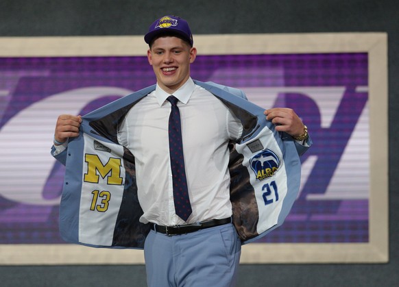 Jun 21, 2018; Brooklyn, NY, USA; Moritz Wagner (Michigan) reacts after being selected as the number twenty-five overall pick to the Los Angeles Lakers in the first round of the 2018 NBA Draft at the B ...