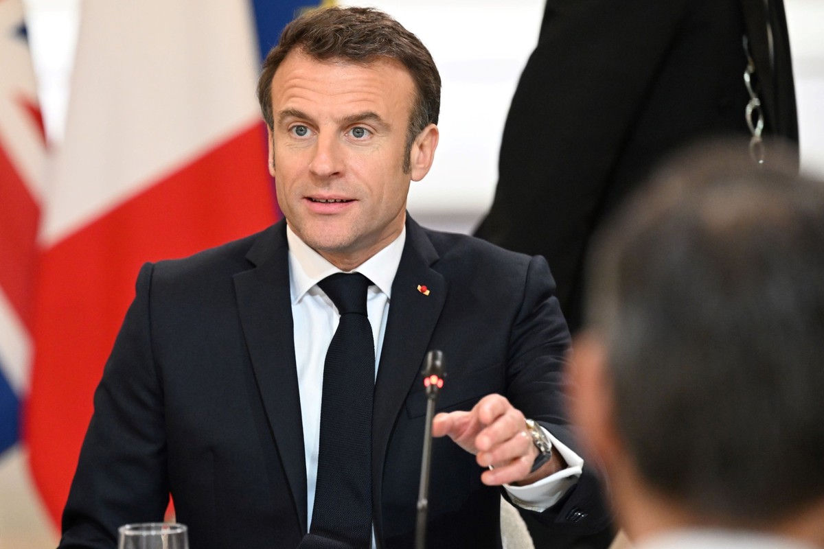 French President Emmanuel Macron attends a meeting with French and British companies, as part of a Franco-British summit at the Elysee Palace, Friday, March, 10, 2023, in Paris. French President Emman ...