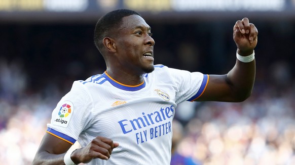 Real Madrid's David Alaba celebrates after scoring his sides first goal during the Spanish La Liga soccer match between FC Barcelona and Real Madrid at the Camp Nou stadium in Barcelona, Spain, S ...