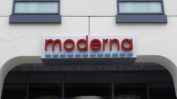 FILE - A sign marks an entrance to a Moderna building in Cambridge, Mass., on Monday, May 18, 2020. Moderna shares slipped Tuesday, April 11, 2023, after the COVID-19 vaccine developer said its potent ...