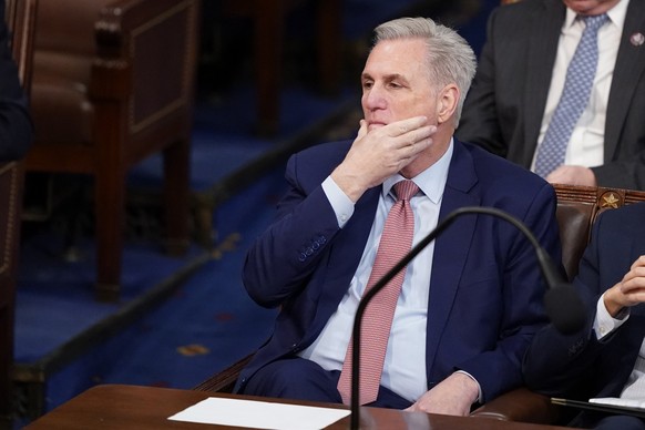 Rep. Kevin McCarthy, R-Calif., listens as the second round of votes are cast for the next Speaker of the House on the opening day of the 118th Congress at the U.S. Capitol, Tuesday, Jan. 3, 2023, in W ...