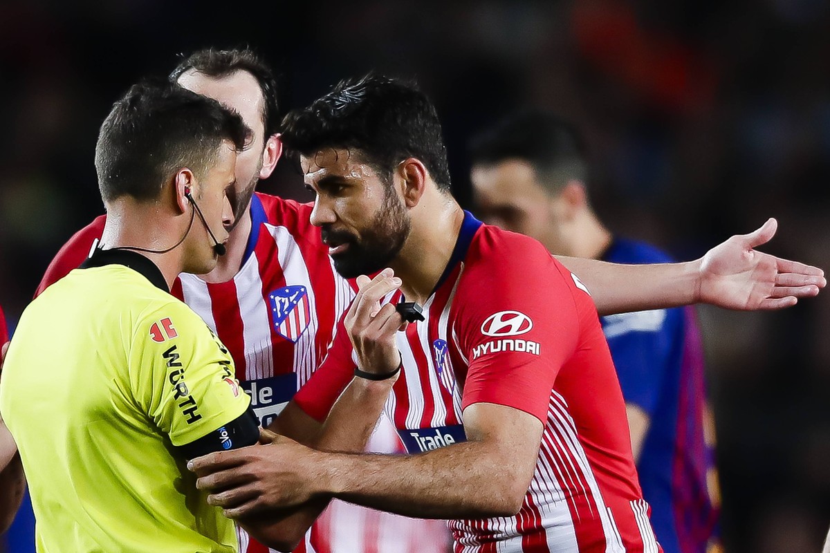 April 6, 2019 - Barcelona, Catalonia, Spain - April 6th, 2019 - Camp Nou, Barcelona, Spain - LaLiga Santander- FC Barcelona Barca v Atletico de Madrid; Diego Costa of Atletico de Madrid speaking with ...