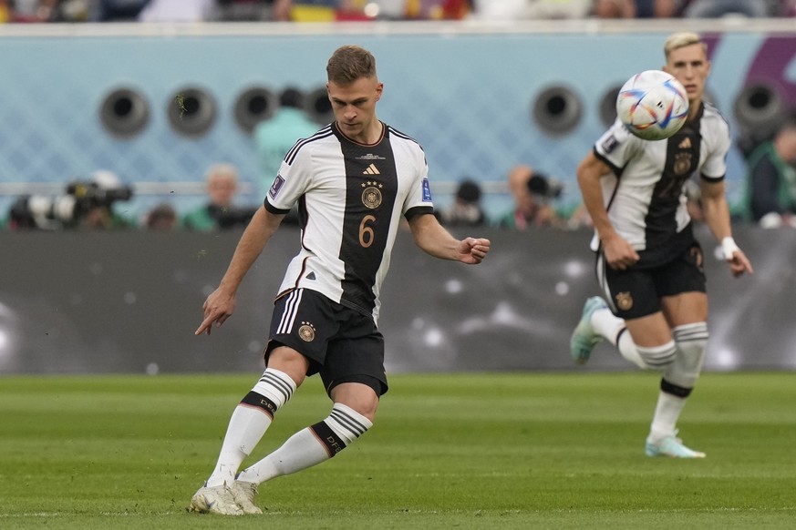 Germany&#039;s Joshua Kimmich plays the ball during the World Cup group E soccer match between Germany and Japan, at the Khalifa International Stadium in Doha, Qatar, Wednesday, Nov. 23, 2022. (AP Pho ...