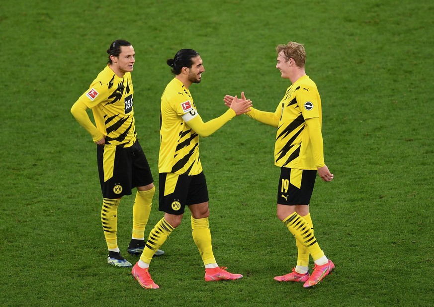 firo : 13.03.2021, Fu?ball: Fussball: 1.Bundesliga, Saison 2020/21 BVB , Borussia Dortmund - Hertha BSC Berlin 2:0 Nico Schulz (BVB), Emre Can (BVB), ganze Figur , mit , und , Julian Brandt , Schlussj ...