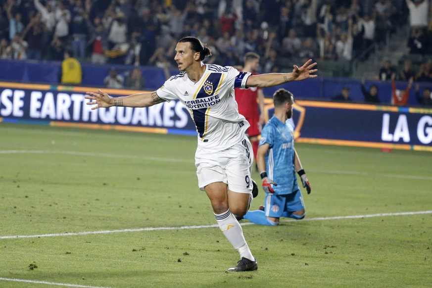 FILE - In this July 4, 2019, file photo, LA Galaxy forward Zlatan Ibrahimovic (9) celebrates scoring a goal during the second half of the team's MLS soccer match against Toronto FC in Carson, Calif. ( ...