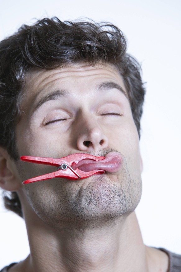 Young man with clothespin attached on lips PUBLICATIONxINxGERxSUIxAUTxONLY A4

Young Man With clothespin Attached ON Lips PUBLICATIONxINxGERxSUIxAUTxONLY A4