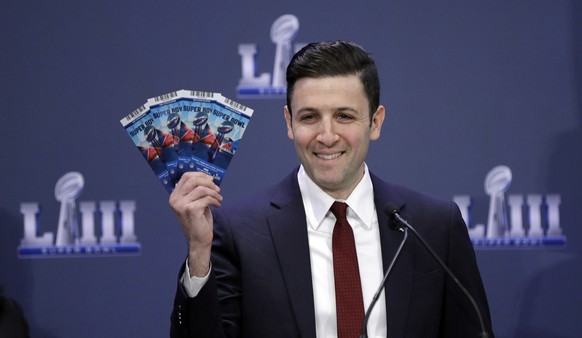 Michael, Buchwald, NFL Senior Counsel, Legal, holds up Super Bowl 53 tickets as he explains the security features on the tickets during a news conference for the NFL Super Bowl 53 football game Thursd ...
