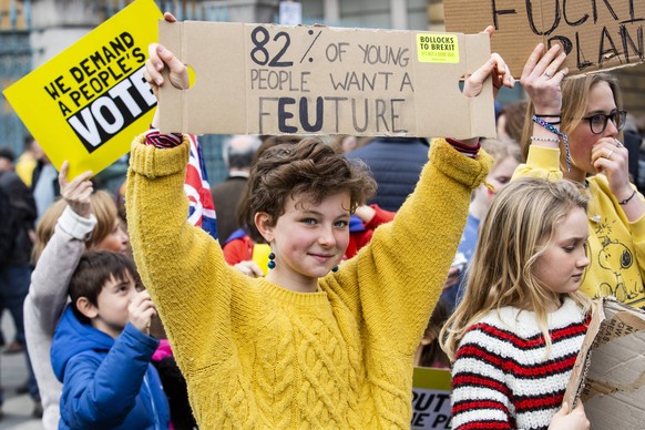 March to Stop Brexit, London, UK London, UK. 23 March 2019. Children are worried about their future. Remain supporters and protesters take part in a march to stop Brexit in Central London calling for  ...