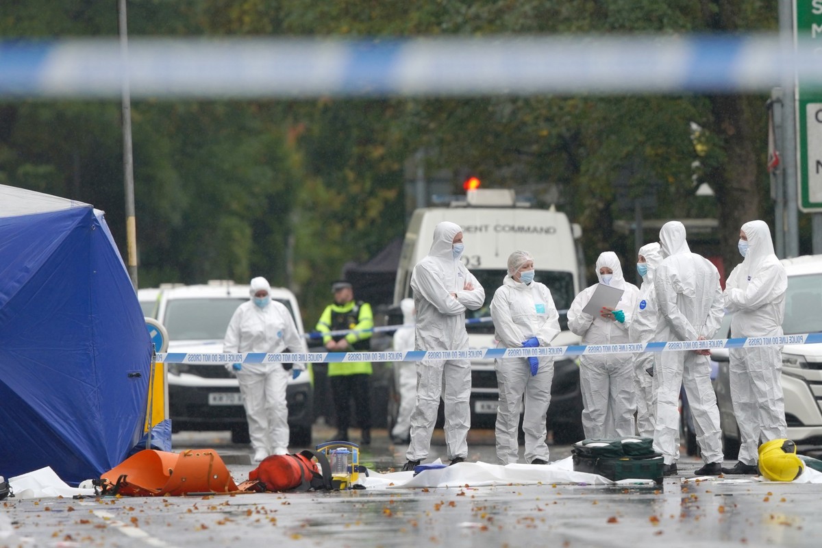 Forensic teams work at the scene of a stabbing incident that took place on Thursday, at Heaton Park Hebrew Congregation synagogue, in Manchester, England, Friday, Oct. 3, 2025. (AP Photo/Ian Hodgson)