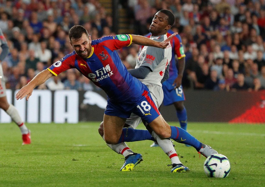 Soccer Football - Premier League - Crystal Palace v Liverpool - Selhurst Park, London, Britain - August 20, 2018 Crystal Palace's James McArthur in action with Liverpool's Georginio Wijnaldum Action I ...