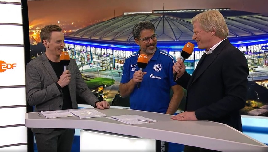 Im ZDF-Studio scherzten Moderator Jochen Breyer, Schalke-Trainer David Wagner und Experte Oliver Kahn über eine Frage in Richtung Alexander Nübel.