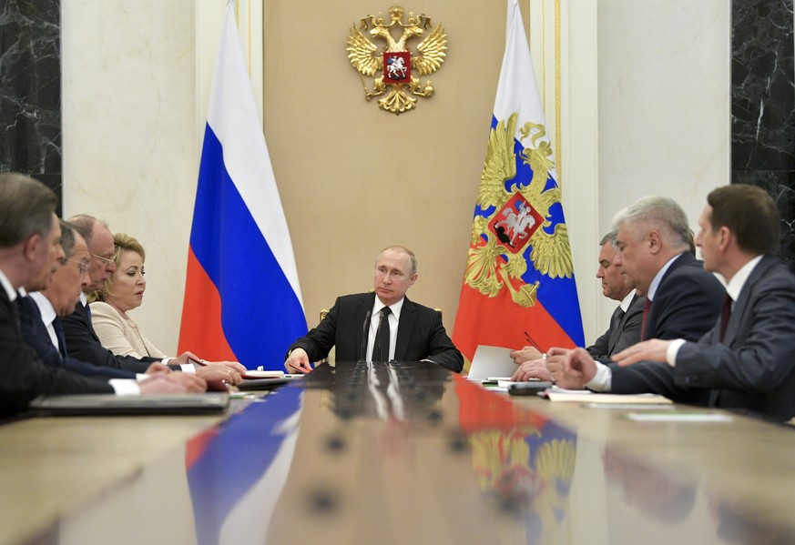 Russian President Vladimir Putin, center, chairs a Security Council meeting in Moscow, Russia, Tuesday, April 30, 2019. (Alexei Druzhinin, Sputnik, Kremlin Pool Photo via AP)