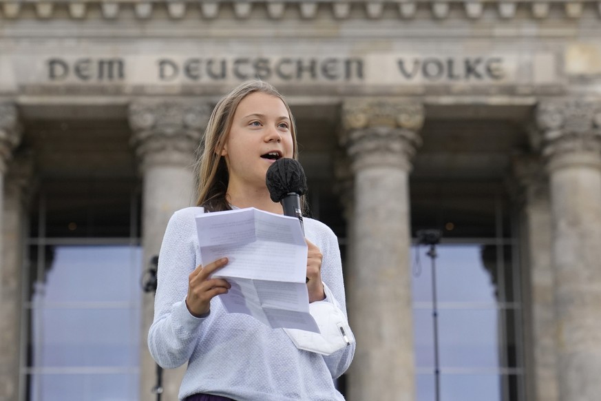 FILE --Swedish climate activist Greta Thunberg holds a speech during a Fridays for Future global climate strike in front of a parliament building in Berlin, Germany, Friday, Sept. 24, 2021. Climate ac ...