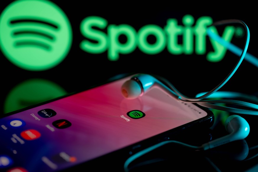 Photo Illustration Spotify Spotify logo displayed on a smart phone with Spotify seen on screen, in this photo illustration, on 15 August 2023 Brussels, Belgium. Photo Illustration by Jonathan Raa/NurP ...