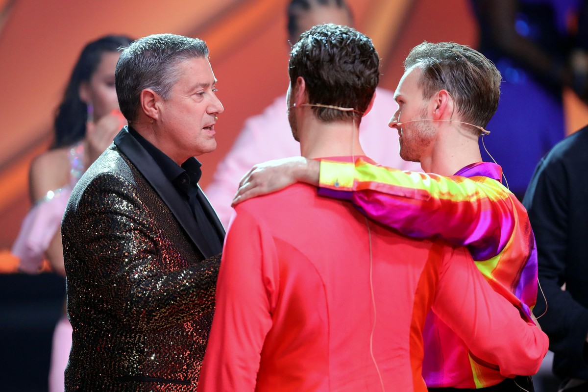 COLOGNE, GERMANY - APRIL 30: Juror Joachim Llambi talks to Nicolas Puschmann and Vadim Garbuzov during the 8th show of the 14th season of the television competition "Let's Dance" on Apr ...