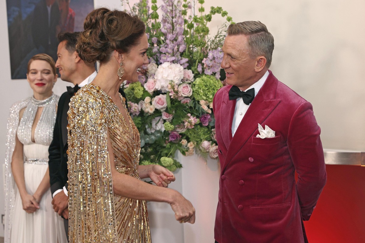 Britain&#039;s Kate, the Duchess of Cambridge, left, speaks to British actor Daniel Craig upon arrival for the World premiere of the new film from the James Bond franchise &#039;No Time To Die&#039;,  ...