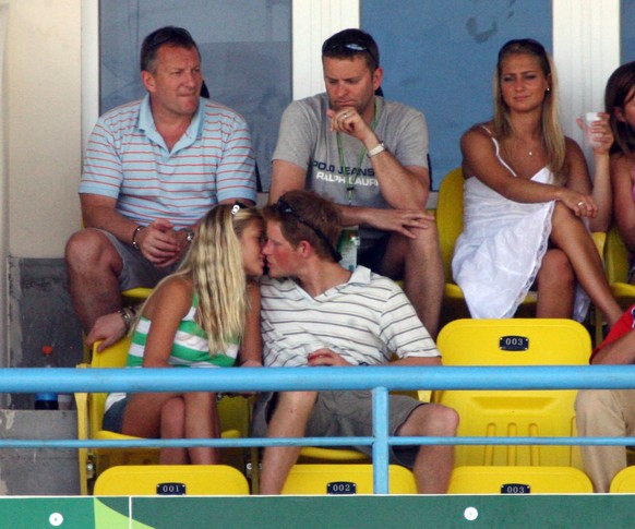 (FILE PHOTO) ST JOHN&#039;S, ANTIGUA AND BARBUDA - APRIL 08: Prince Harry kisses girlfriend Chelsy Davy as they watch the action during the ICC Cricket World Cup 2007 Super Eight match between England ...