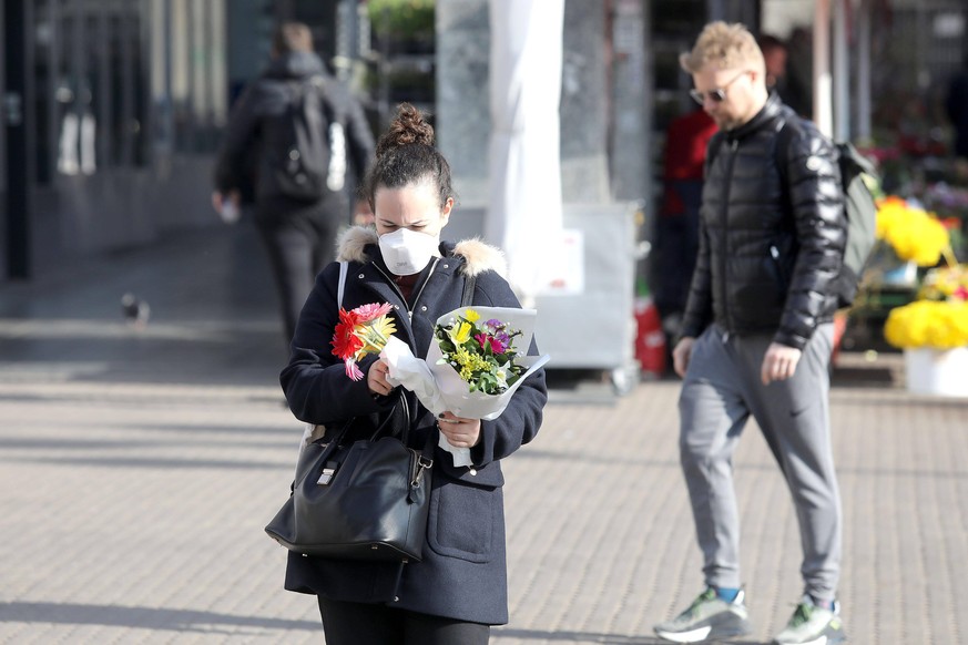 PXL_No Easter Tourism in Croatia Thanks to Third Wave People wearing masks are seen in the city center, in Zagreb, Croatia, on March 26, 2021. It s increasingly likely that there will be no Easter tou ...