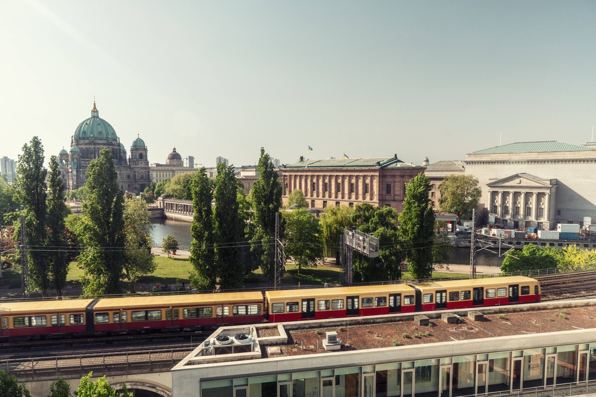 Germany, Berlin, Train with Museum Island in background, TAMF04239