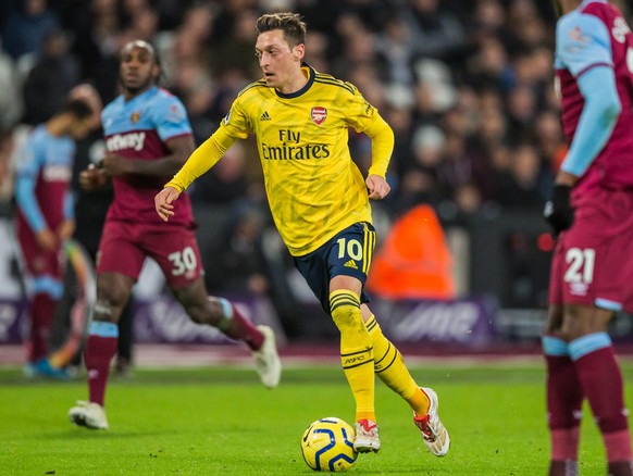 firo : 09.12.2019 Premier League West Ham United Westham - Arsenal London 1:3 Einzelaktion , Mesut Özil