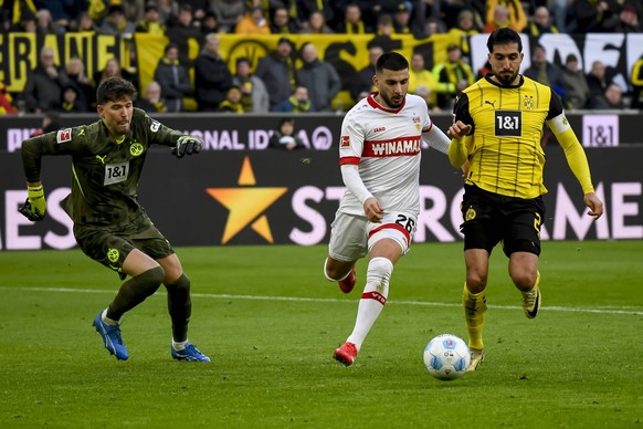 Goalkeeper Gregor Kobel Borussia Dortmund, Deniz Undav VfB Stuttgart und Emre Can Borussia Dortmund im Kampf um den Ball waehrend des Spiels der 1. Bundesliga zwischen Borussia Dortmund und VfB Stuttg ...