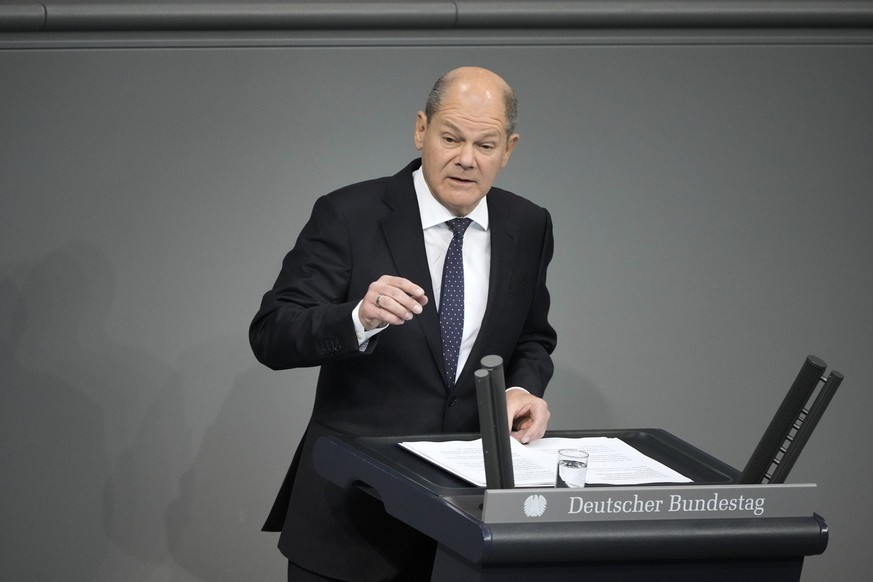 German Chancellor Olaf Scholz delivers a speech during the debate at the German parliament Bundestag in Berlin, Germany, Wednesday, Nov. 23, 2022. (AP Photo/Markus Schreiber)