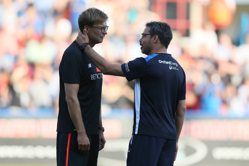 Mandatory Credit: Photo by Paul Currie/BPI/Shutterstock 5777936r Liverpool manager Jurgen Klopp and Huddersfield Town manager David Wagner before the Pre Season Friendly match between Huddersfield Tow ...